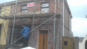 Pauls Plastering - Render removed to reveal bare brick
